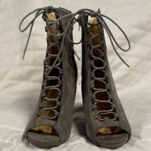 Lace up heeled booties size 6
